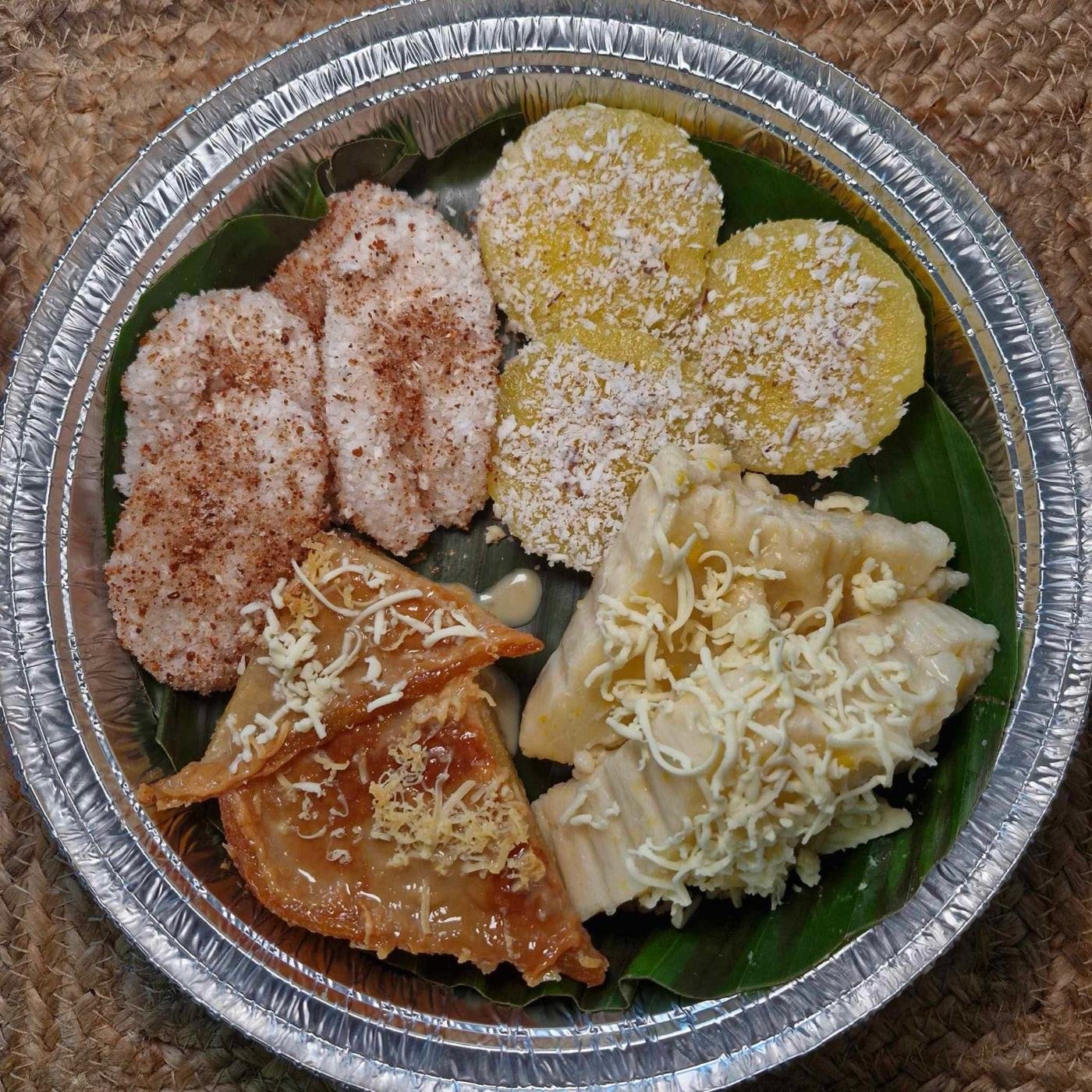 Kakanin tray with maja blanca, sapin-sapin, palitaw, and cassava cake