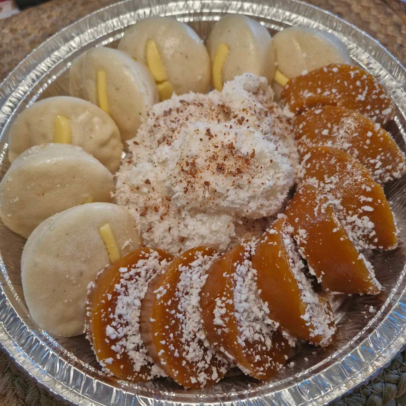 Kakanin tray with puto cheese, kutsinta, and palitaw